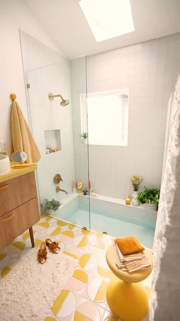 Sunken tub is a unique design for a small bathroom